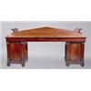 Image 1 : A MAHOGANY SIDEBOARD, c.1820, IN GRECIAN TASTE, panelled triangular gallery, the rectangular t...