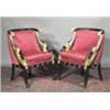 Image 1 : A PAIR OF EBONISED AND PARCEL GILT ARMCHAIRS, IN EMPIRE STYLE, the beaded bowed back rails wit...
