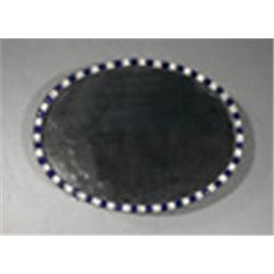 AN OVAL MIRROR, IN IRISH 18th CENTURY STYLE, the frame with alternate facet cut studs with blu...