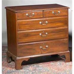 A MAHOGANY CHEST, 18th CENTURY, the moulded rectangular top above two short and three long gra...