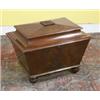 Image 1 : a mahogany wine cooler, early 19th century, sarcophagus shaped, the lid with ribbed finial, th...