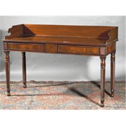 A MAHOGANY SERVING TABLE, IRISH EARLY 19th CENTURY, with three quarter gallery back, reeded ri...