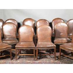 A SET OF TWELVE MAHOGANY FRAMED DINING CHAIRS, IN GEORGIAN STYLE, with oval backs and serpenti...