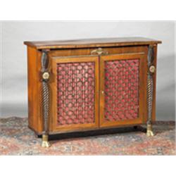 A ROSEWOOD SIDE CABINET, EARLY 19th CENTURY, plain rectangular top above a frieze applied with...