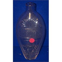A LARGE CUT GLASS FLASK, EARLY 19th CENTURY, with facet cut shoulders, the front engraved with...