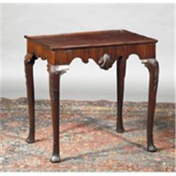 A MAHOGANY TEA TABLE, IRISH, BASICALLY 18th CENTURY, moulded tray top above shaped aprons, cen...