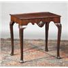 Image 1 : A MAHOGANY TEA TABLE, IRISH, BASICALLY 18th CENTURY, moulded tray top above shaped aprons, cen...