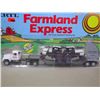 Image 1 : 1/64 Stock No. 1412 Frmlnd Exp Mac Equipment Hauler with Case 2294 Tractors