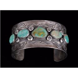 Navajo Silver and Green Turquoise Bracelet with Incised Designs 6" L. 1 1/8" W.  Fine Condition