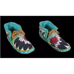 Pair of Plains Beaded Moccasins with Feather and Rose Design 10" L.  Fine Condition