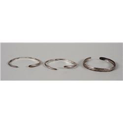 Three Northwest Coast 19TH C. Silver Bracelets 6 1/4" L. 1/8" W. - 7" L. 1/4" W.  All in Good Condit