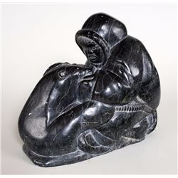 Large Inuit Soapstone Carving of a Hunter with Seal E9-908  11" H. 7" W. 14" Deep  Good Condition wi