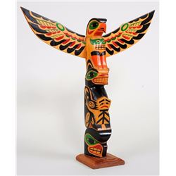 Bella Coola Totem Carved with Eagle, Bear Holding a Copper and a Thunder Mask Signed W. Mack 15" H. 