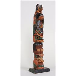 Northwest Coast Totem Carved with Eagle, Killer Whale, Bear and Raven Holding a Salmon 19" H. 5" W. 