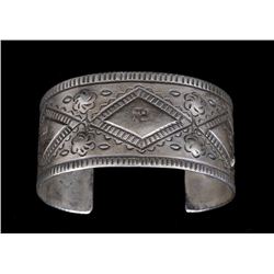 Navajo Silver Cuff Bracelet with Stamped Design, Fred Harvey Era 6 1/4" L. 1 3/8" W.  Good Condition