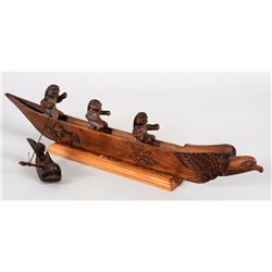 Makah Canoe with Eagle Figured Prow and Three Hunters Towing a Whale 17" L. Ex: Peterborough Museum 
