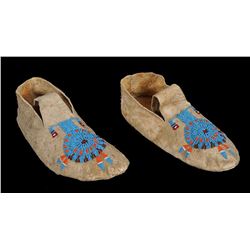 Pair of Sinew Sewn Buffalo Hide Moccasins with Geometric Design Deaccessioned Glenbow Museum, AB 10 