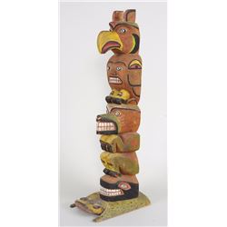 Northwest Coast Totem Carved with Thunderbird and Bear on a Frog Base ca. 1950's 38" H. 9" W. 13 1/2
