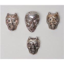Three Miniiature Cast Silver Bukwus Masks Signed LKM 1 1/8"x 1 1/2" and an Unsigned Miniature Silver