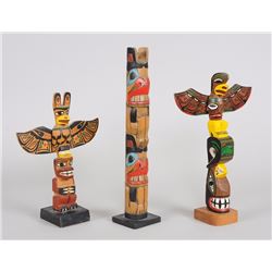 Three Northwest Coast Totems 9" H. - 12" H. One Signed Ruben Wallace  All in Good Condition