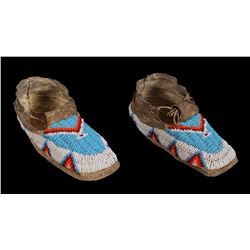 Pair of Child's Beaded Moccasins with Geometric Design and Parfleche Soles 7 1/2" L.  Good Condition