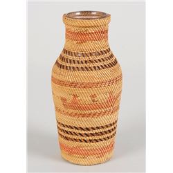 Nuu-chah-nulth Basketry Covered Bottle with Canoe and Eagle Design 8 1/2" H. 4" W.  Good Condition