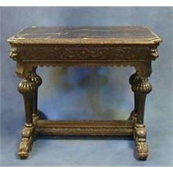 A Victorian carved oak centre table raised on 4 turned column supports united by a carved X frame...