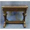 Image 1 : A Victorian carved oak centre table raised on 4 turned column supports united by a carved X frame...