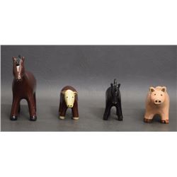 FOUR POTTERY ANIMALS (MANNYGOATS)