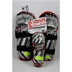 BOX WITH THREE PAIRS OF NEW NITRO CIRCUS KNEE PADS