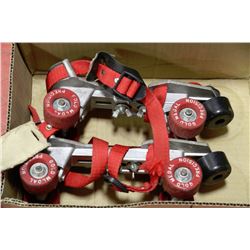 PAIR OF VINTAGE STRAP-ON ROLLER SKATES