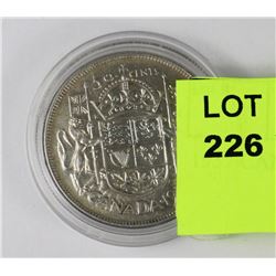 1957 CANADIAN 50 CENT PIECE
