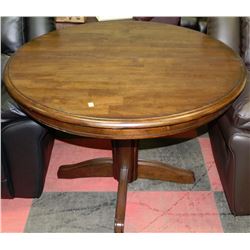 ROUND WOOD PEDESTAL TABLE WITH BUTTERFLY LEAF