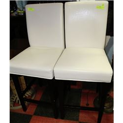 PAIR OF SHOWHOME WHITE LEATHERETTE STOOLS