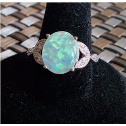 WHITE FIRE OPAL RING SET IN .925 STAMPED SILVER