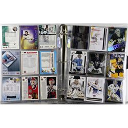 BINDER OF MIXED GOALIE CARDS