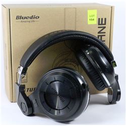 PAIR OF NEW BLUETOOTH OVER EAR HEADPHONES