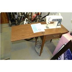 SINGER SEWING MACHINE IN CABINET