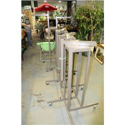 LOT OF 4 ADJUSTIBLE  CLOTHING RACKS ON CASTORS