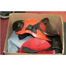 BOX OF CHAIN SAW PANTS AND HELMET