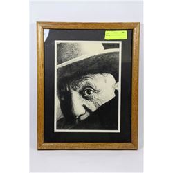 1970'S PAINTING OF A MAN IN A HAT