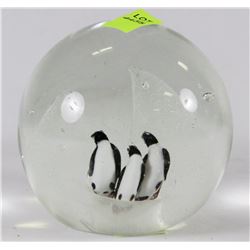 PAPERWEIGHT PENGUINS IN THE ARCTIC