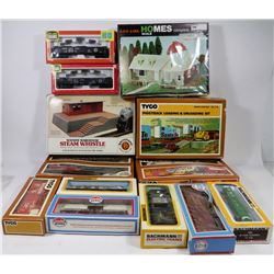 BOX WITH ASSORTED COLLECTIBLE TYCO TRAIN PARTS,