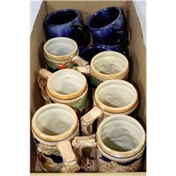 BOX WITH 6 STEINS AND BLUE MOUNTAIN POTTERY CUPS