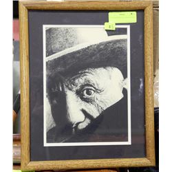 1970'S PAINTING OF A MAN IN A HAT