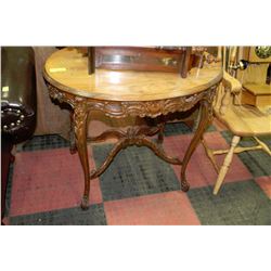 VINTAGE WOOD CARVED OVAL TABLE