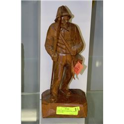 HAND CARVED CARON FISHERMAN SCULPTURE