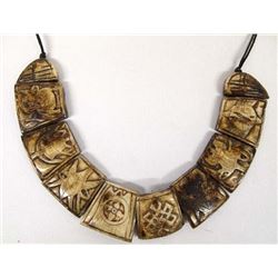 Intricately Carved Bone Necklace on String