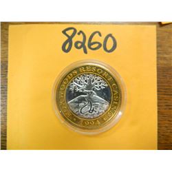 .999 Fine silver casino $10 token/strike ASW= .60 oz.