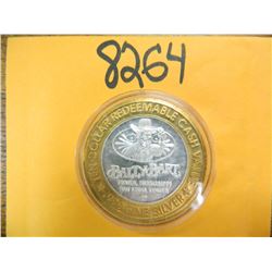 .999 Fine silver casino $10 token/strike ASW= .60 oz.